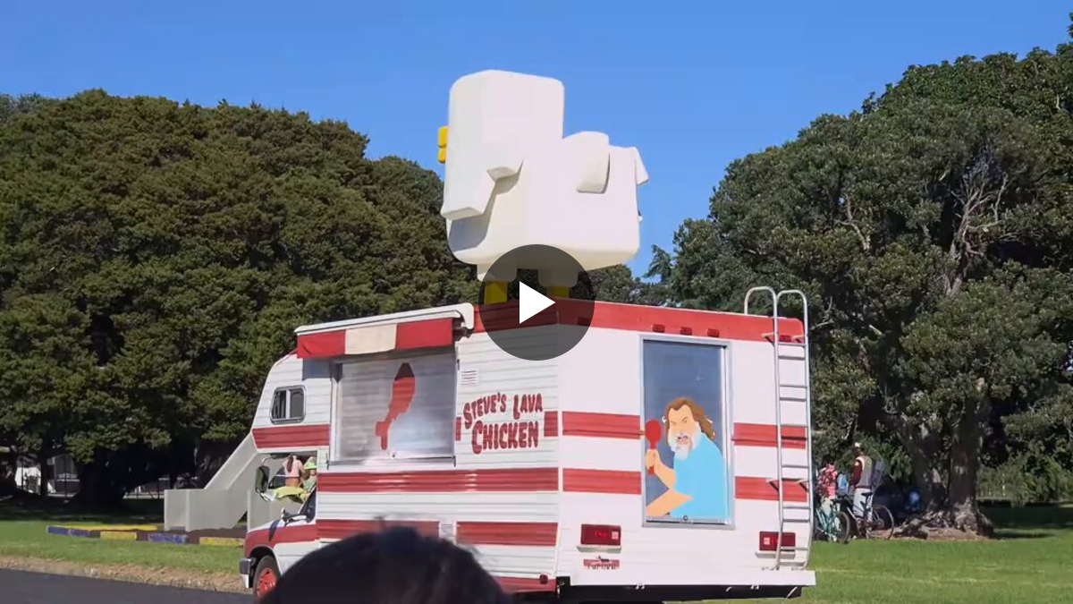 Unofficial behind-the-scenes footage still of Jack Black as Steve driving the lava chicken vehicle past creeper garden and iron golem playground sets